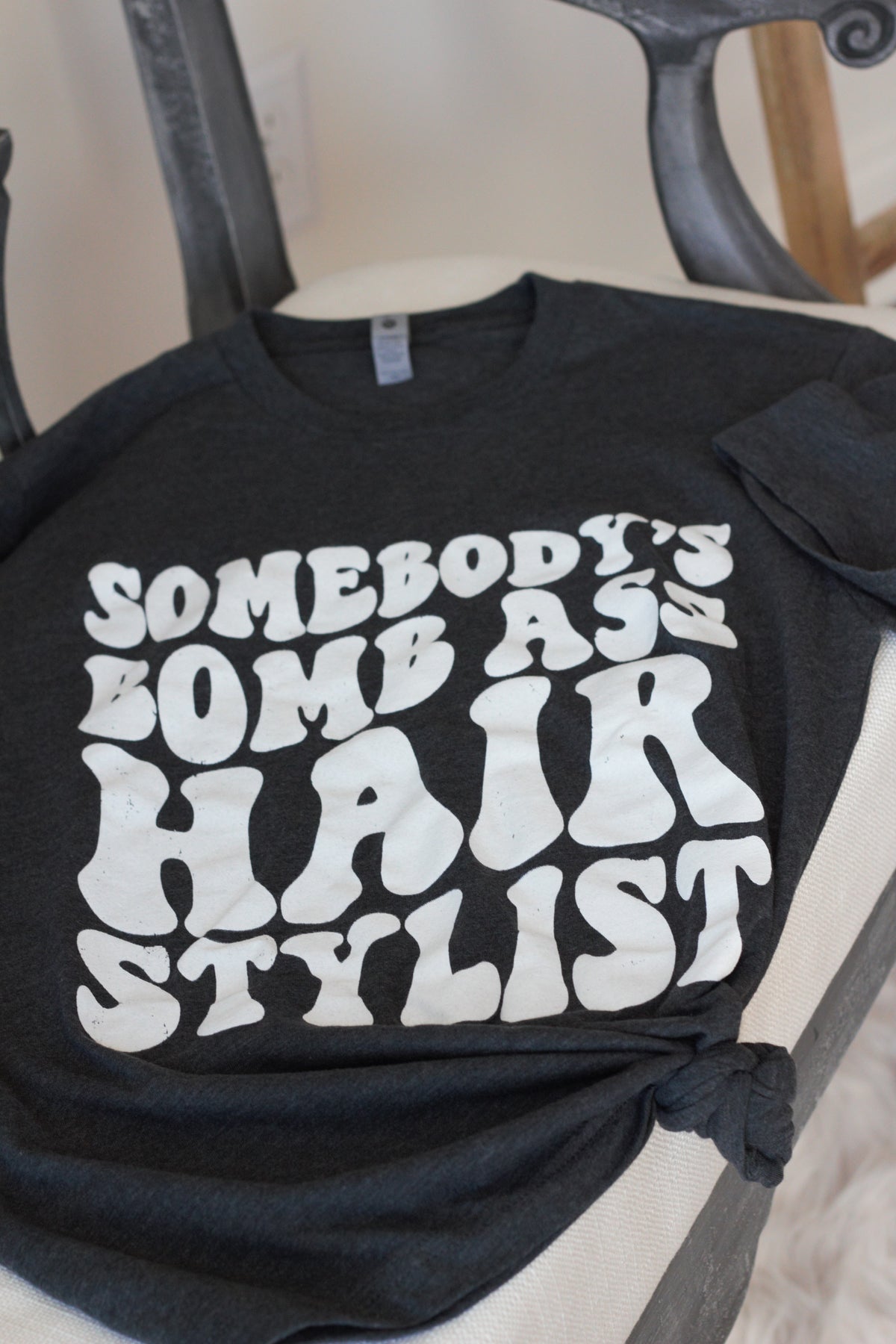 Somebody's Bomb Ass Hair Stylist GraphicTee